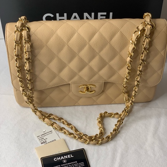 CHANEL Handbags - 🦄 Chanel Jumbo Beige Clair Caviar GHW Double Flap
